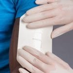 Sweat patch overlay protects patch